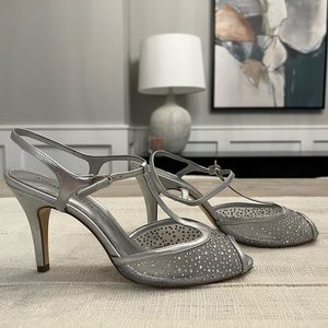 Like-new Silver low heels. Size 9. Ships free!